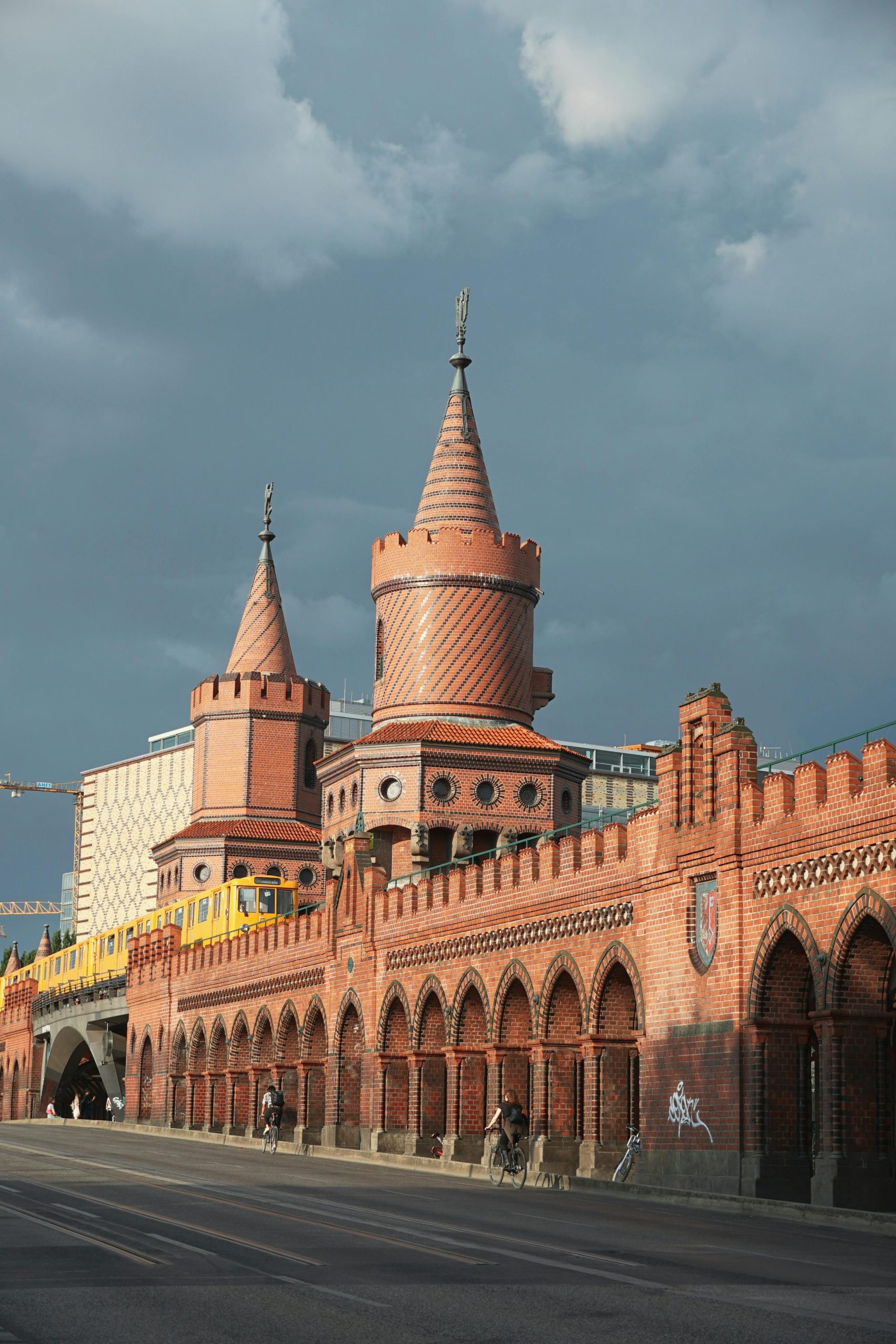Iconic Oberbaum Bridge in Berlin with historical architecture against a clear sky.