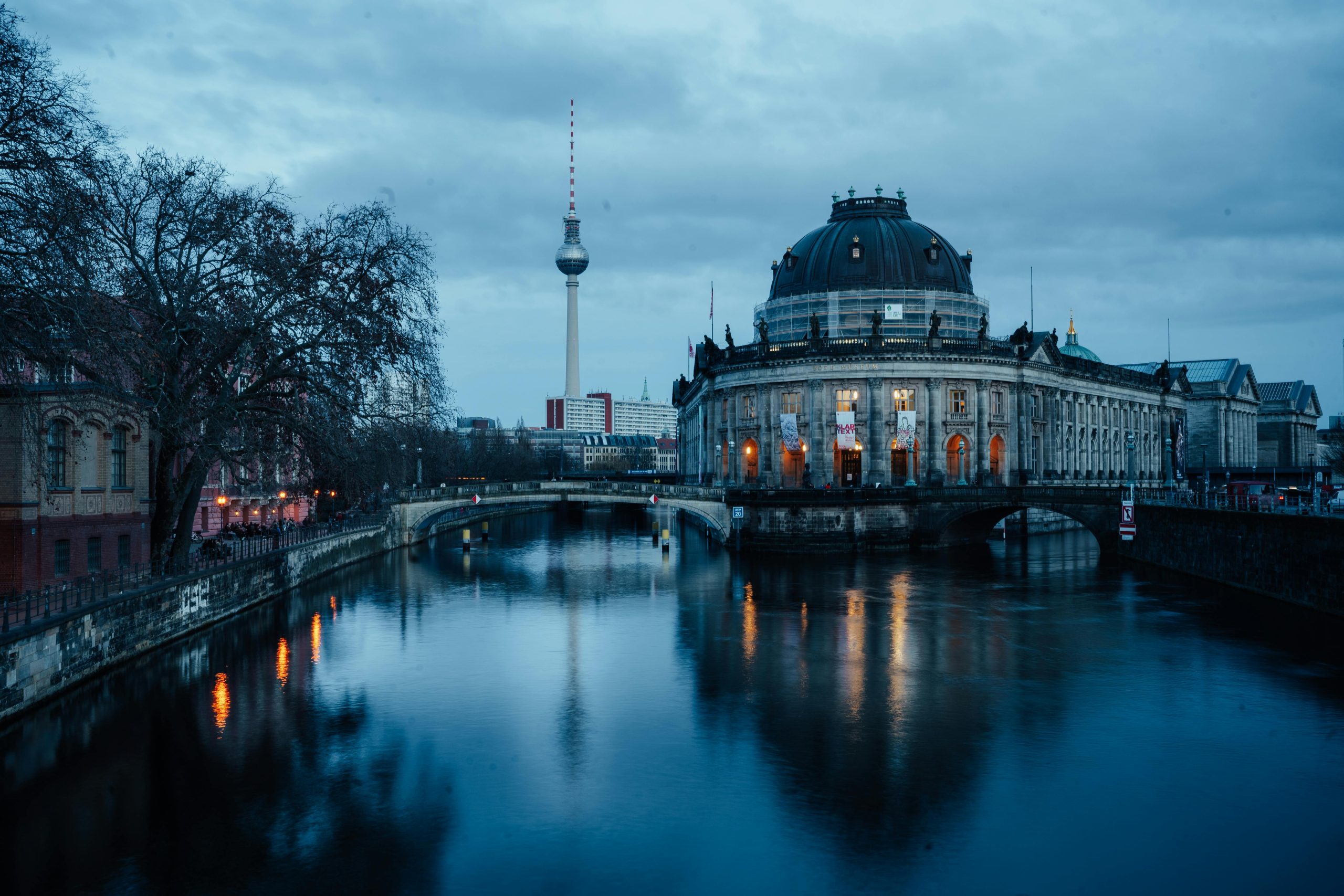Scenic view of Berlin's Museum Island with the Fernsehturm tower at dawn.
